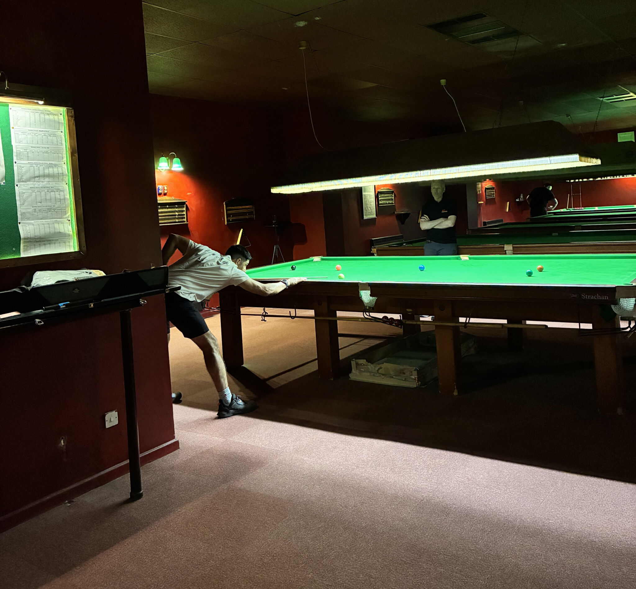 Man playing snooker